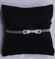 Double heart motif with a fine mesh chain bracelet